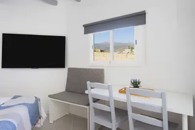 img/masonry/chebika-oasis-studio/Estudio 1 - Vistas desde mesa comedor.webp