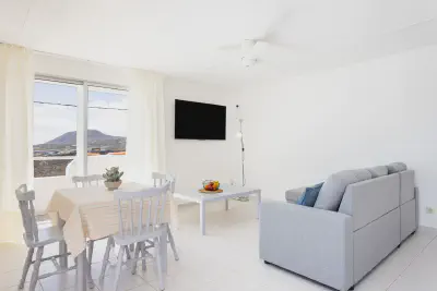 img/masonry/siwa-oasis-apartment/Apartamento - Salon comedor vista ventanal.webp