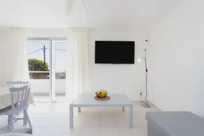 img/masonry/siwa-oasis-apartment/Apartamento - Sofa ventana salon.webp