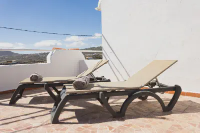 img/masonry/siwa-oasis-apartment/Apartamento - Terraza - Tumbonas.webp